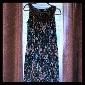 Earth tones and jeweled business casual